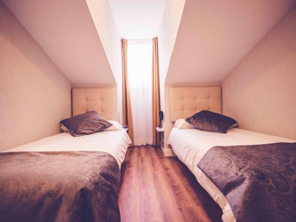 Hostal Lisboa : photo 6 de la chambre chambre lits jumeaux