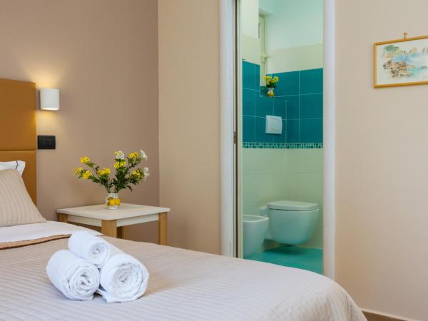 B&B Giacomino : photo 4 de la chambre chambre double ou lits jumeaux avec balcon