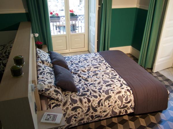 B&B Umberto 134 : photo 1 de la chambre chambre quadruple supérieure 