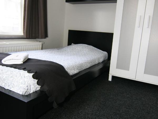 Budgethotel de Zwaan : photo 1 de la chambre chambre simple avec salle de bains commune