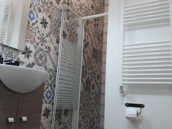 Testa o Croce Casa Vacanze : photo 4 de la chambre chambre double ou lits jumeaux avec salle de bains privative externe