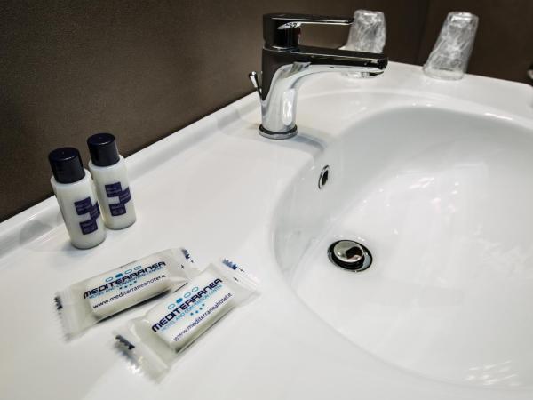 Mediterranea Hotel & Convention Center : photo 10 de la chambre chambre triple