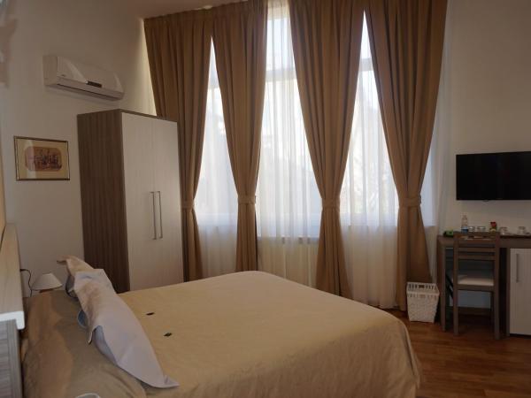 B&B I Tetti di Siena : photo 4 de la chambre chambre double ou lits jumeaux Économique - vue sur jardin