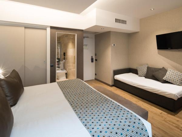 Catalonia Born : photo 1 de la chambre chambre triple (3 adultes)