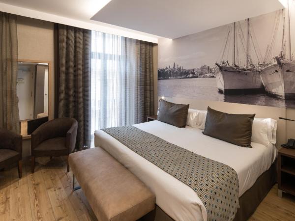 Catalonia Born : photo 4 de la chambre chambre triple (3 adultes)