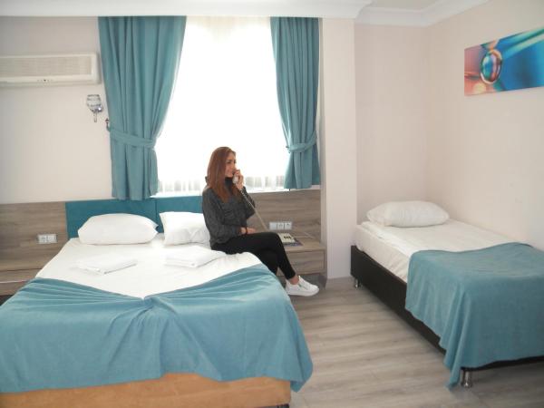 Sava Hotel : photo 7 de la chambre chambre triple