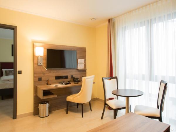 Naam Hotel & Apartments Frankfurt City-Messe Airport : photo 5 de la chambre appartement supérieur
