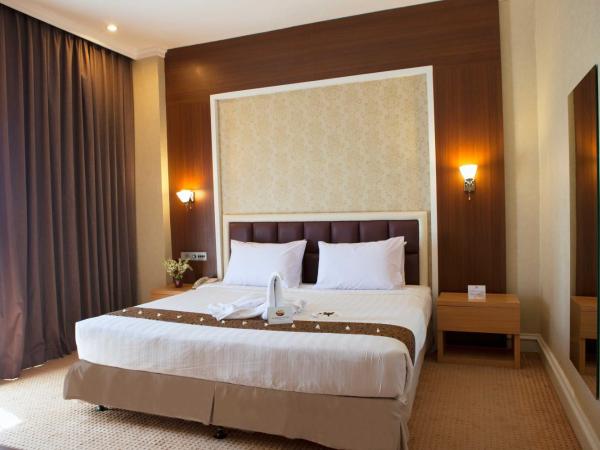 Surabaya Suites Hotel Powered by Archipelago : photo 2 de la chambre suite deluxe
