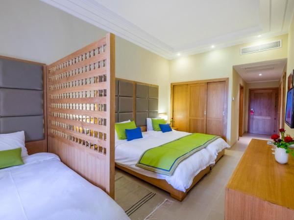 Hotel Bel Azur Thalasso & Bungalows : photo 2 de la chambre chambre triple - vue sur jardin