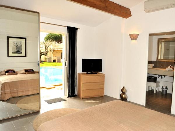 Villa Made : photo 8 de la chambre chambre double supérieure - vue sur piscine