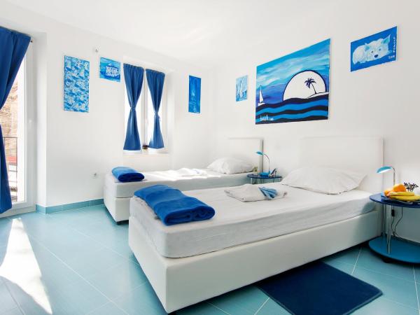 Old City Rooms : photo 4 de la chambre chambre double ou lits jumeaux avec balcon