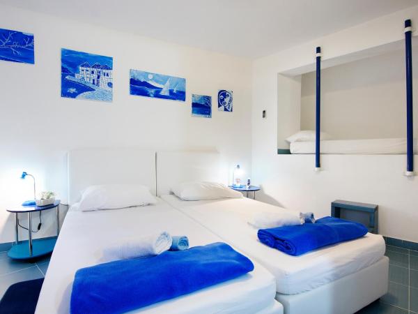 Old City Rooms : photo 1 de la chambre chambre double ou lits jumeaux avec lit d'appoint