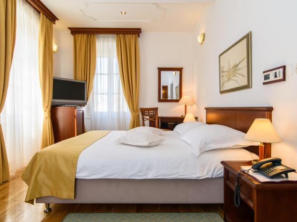 Heritage Hotel Vila Sikaa : photo 8 de la chambre chambre supérieure