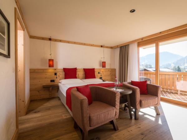 Hotel Spitzhorn Superieur : photo 2 de la chambre suite junior avec balcon ou terrasse