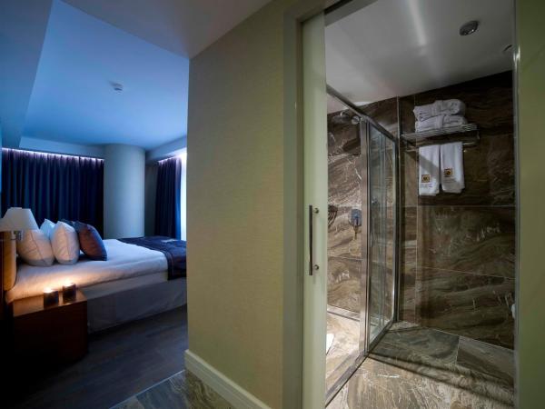 Taba Luxury Suites and Hotel : photo 3 de la chambre chambre lits jumeaux/double standard