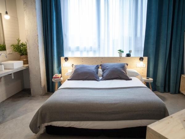 Talo Urban Rooms : photo 1 de la chambre chambre double ou lits jumeaux avec salle de bains privative