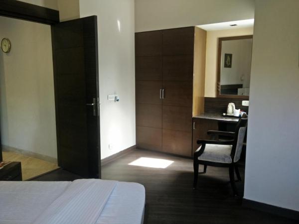 Enkay Residency M-Block Cyber City : photo 4 de la chambre suite