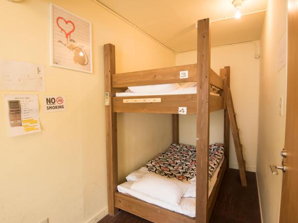 Hostel Q : photo 4 de la chambre chambre quadruple avec salle de bains commune