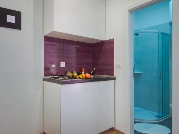 Top Center Rooms & Studio : photo 5 de la chambre studio triple standard