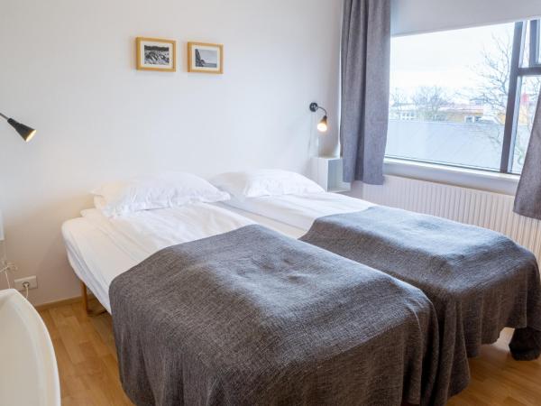 Guesthouse Sunna : photo 1 de la chambre chambre lits jumeaux basique avec salle de bains commune