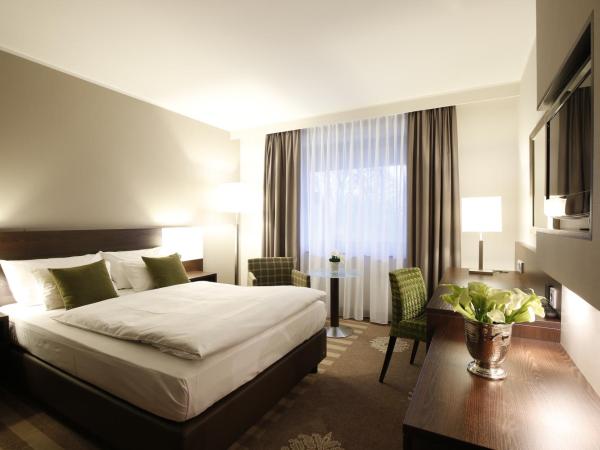 Parkhotel Wittekindshof : photo 1 de la chambre einzelzimmer mit französischem bett