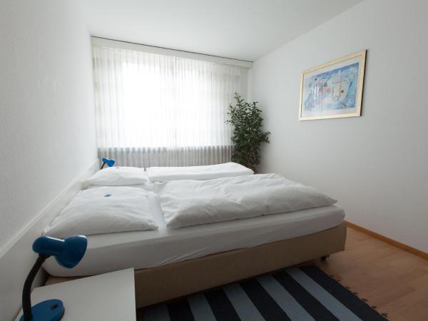 Hotel Alpha : photo 3 de la chambre chambre lits jumeaux avec salle de bains commune