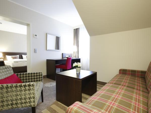 Parkhotel Wittekindshof : photo 2 de la chambre suite junior - vue sur jardin