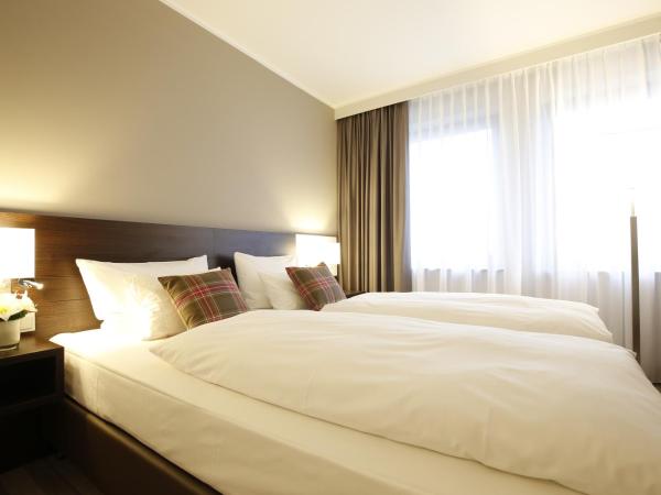 Parkhotel Wittekindshof : photo 1 de la chambre suite junior - vue sur jardin