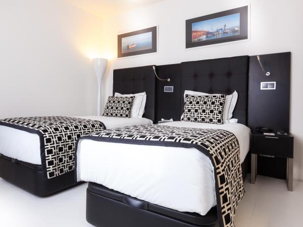 Faro Boutique Hotel : photo 4 de la chambre chambre double ou lits jumeaux supérieure