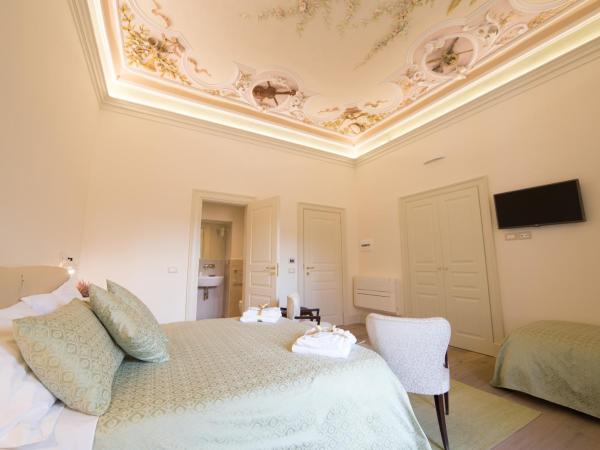 Il Leone Blu : photo 3 de la chambre chambre triple de luxe