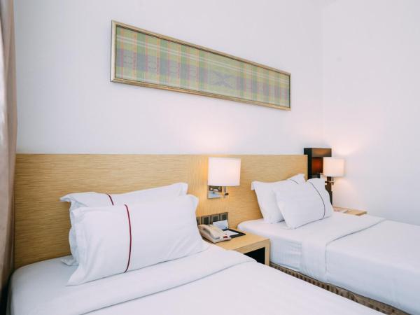 Hotel Granada Johor Bahru : photo 7 de la chambre chambre lits jumeaux deluxe