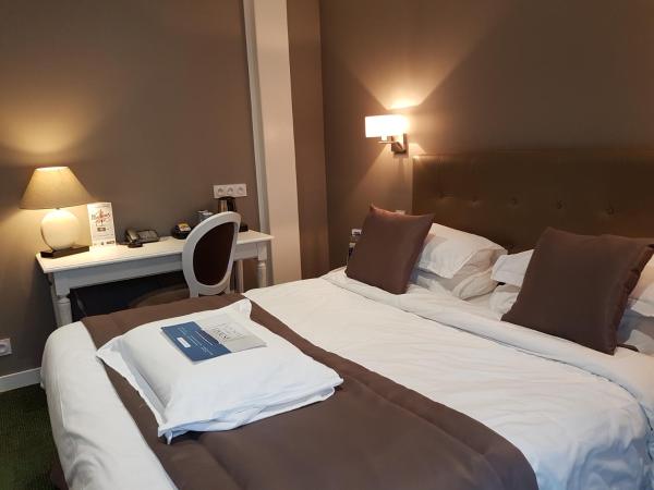 Kyriad Saumur Hyper Centre Hôtel Appartements et SPA soins Sothys Paris : photo 2 de la chambre chambre double confort