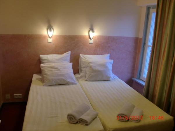 Budget Hotel Neutraal : photo 4 de la chambre petite chambre quadruple