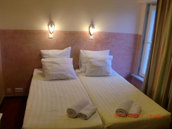 Budget Hotel Neutraal : photo 3 de la chambre petite chambre quadruple