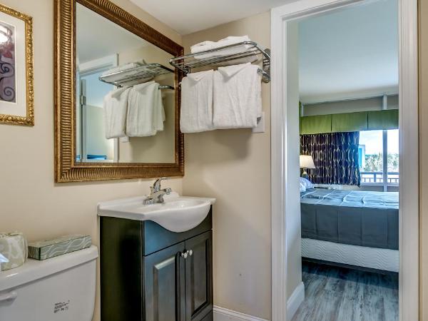 Beachcomber Inn & Suites : photo 3 de la chambre suite lit king-size