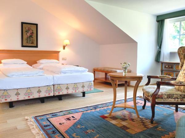 Hotel Landhaus Fuhrgassl-Huber : photo 1 de la chambre chambre triple