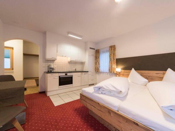 Appartements Garni Alpin Live : photo 2 de la chambre studio avec balcon