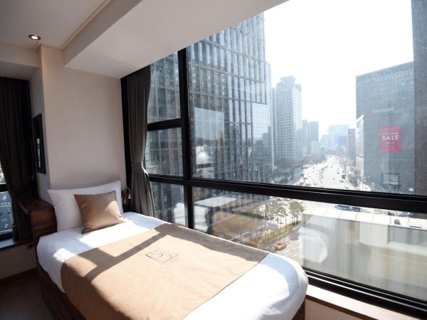 57 Myeongdong Hostel : photo 4 de la chambre chambre lits jumeaux deluxe