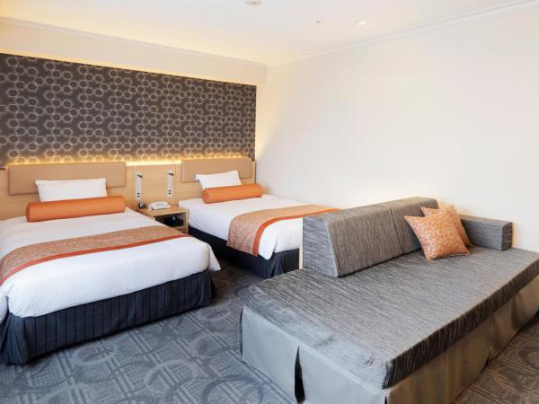 Sapporo Excel Hotel Tokyu : photo 2 de la chambre chambre lits jumeaux supérieure avec lit d'appoint - non-fumeurs - Étage avec vue sur excel