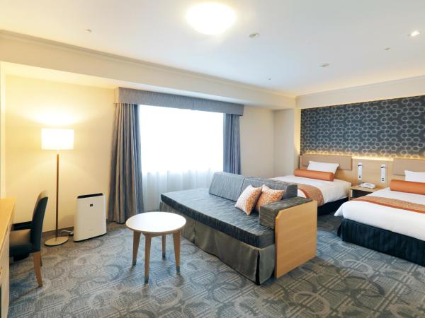 Sapporo Excel Hotel Tokyu : photo 1 de la chambre chambre lits jumeaux supérieure avec lit d'appoint - non-fumeurs - Étage avec vue sur excel