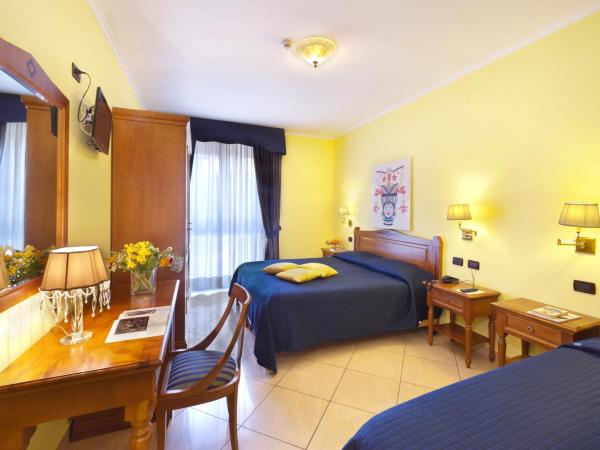 Ulisse Deluxe Hostel : photo 2 de la chambre chambre quadruple