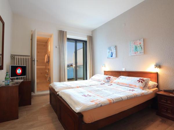 Osteria Ticino by Ketty & Tommy : photo 3 de la chambre chambre double ou lits jumeaux avec balcon - vue sur jardin