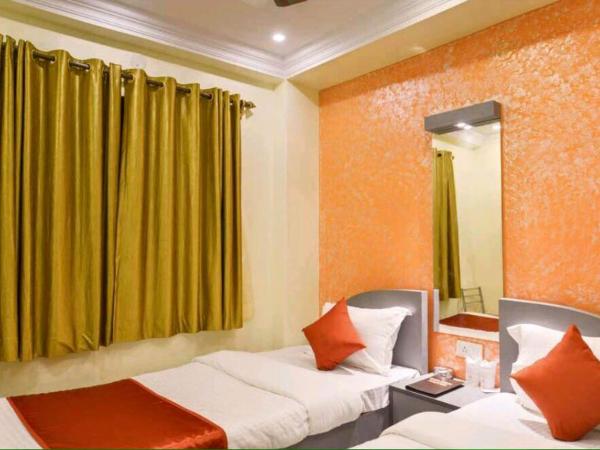 Golden Heaven Hotel : photo 1 de la chambre chambre lits jumeaux deluxe