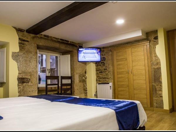 Oxford Suites Santiago de Compostela : photo 2 de la chambre chambre lits jumeaux deluxe