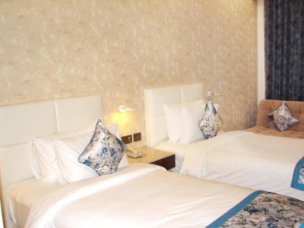 Hotel Grand Maple : photo 5 de la chambre chambre lit king-size deluxe