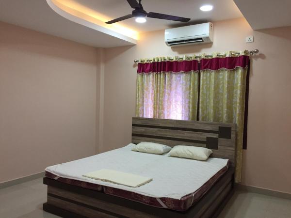 Mega Tourist Home Palarivattom : photo 9 de la chambre chambre double deluxe