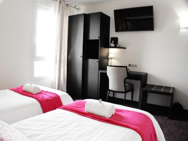 Les Grains d'Argent Dizy - Epernay : photo 1 de la chambre chambre lits jumeaux