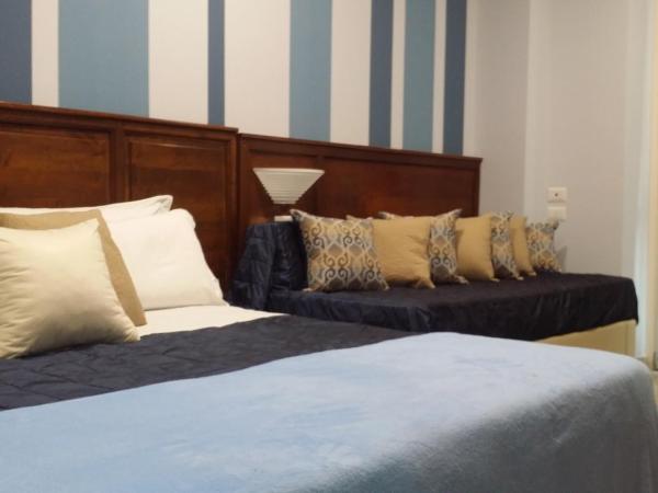 Hotel Giulio Cesare : photo 5 de la chambre chambre triple - accessible aux personnes à mobilité réduite