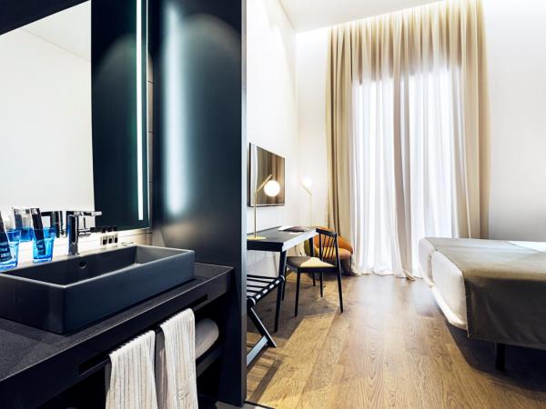 One Shot Mercat 09 : photo 4 de la chambre suite standard