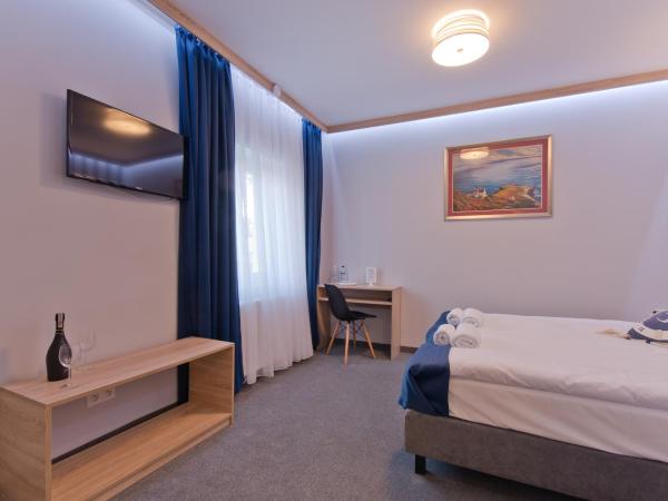 B&B Molo : photo 7 de la chambre chambre double ou lits jumeaux avec salle de bains privative